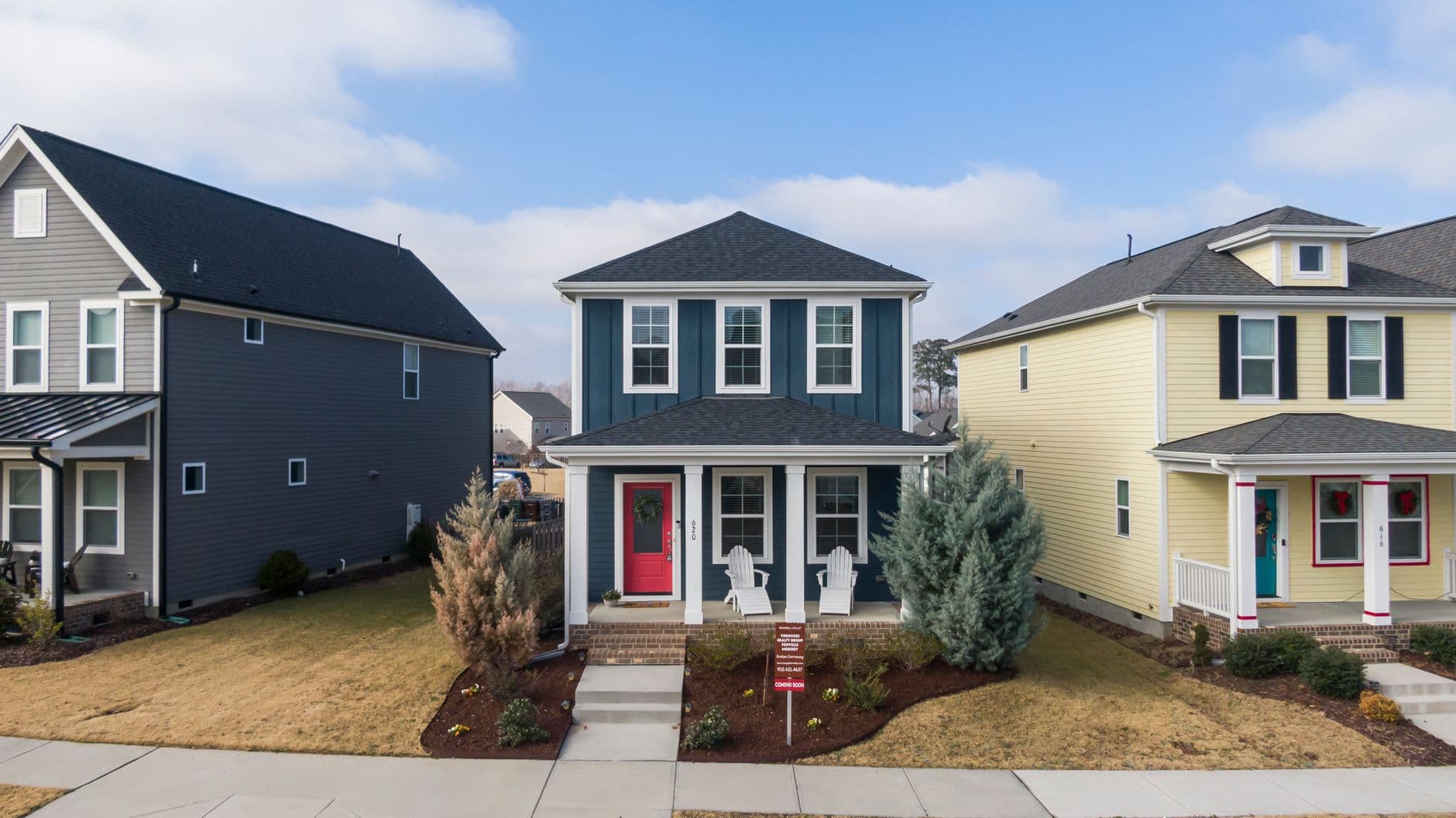Aerial view of charming suburban homes in Wendell, NC, showcasing modern architecture.